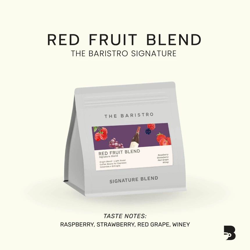 The Baristro Signature Red Fruit Blend 100g light roast coffee beans in branded packaging, blended from Colombia and Ethiopia.