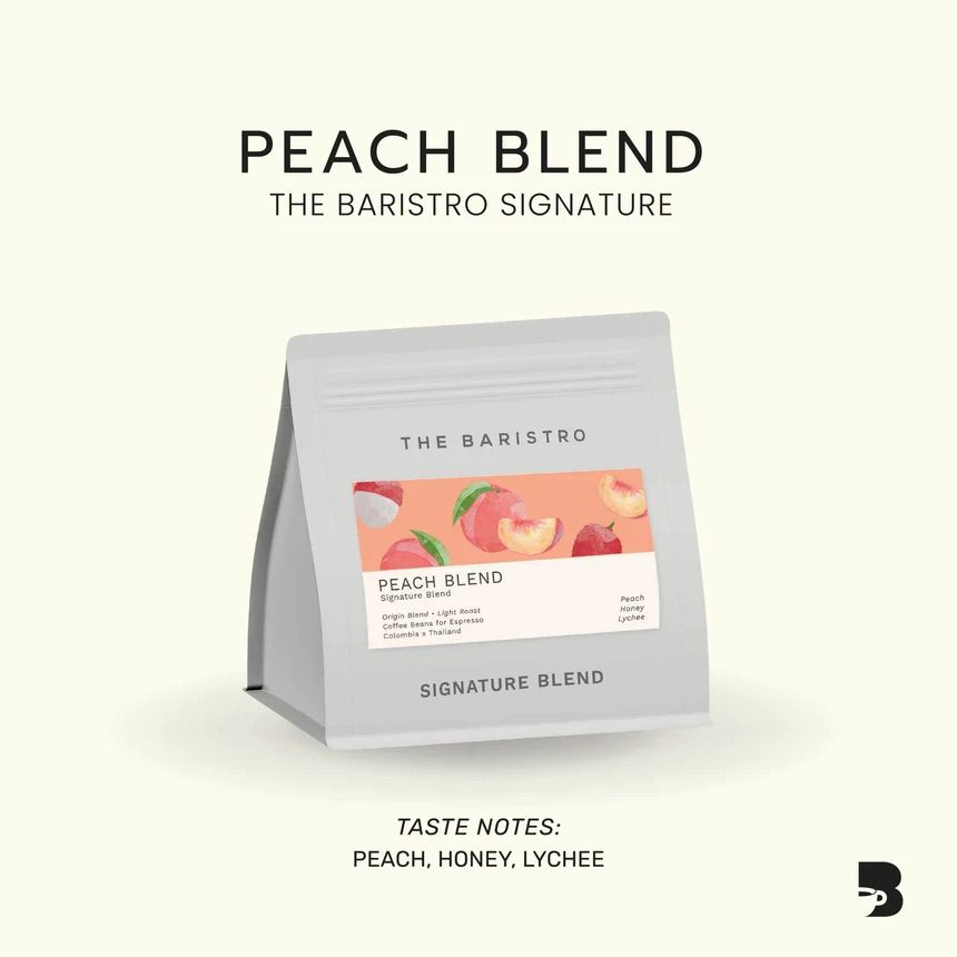 The Baristro Signature Peach Blend 100g light roast specialty coffee beans from Colombia and Thailand, with peach, honey and lychee tasting notes, available at Lamora UAE.