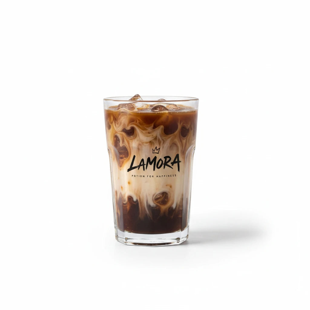 Lamora iced coffee in a branded glass with swirling milk and dark coffee layers against a white background