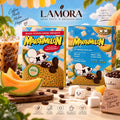 Lamora Marshmelon medium roast coffee bean boxes with melon, marshmallows, and iced coffee on a sunny table