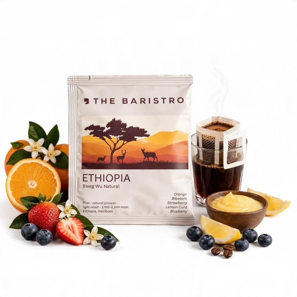 Lamora The Baristro Ethiopia Bweg Wu natural specialty coffee drip bag with orange, strawberry, and blueberry garnish.