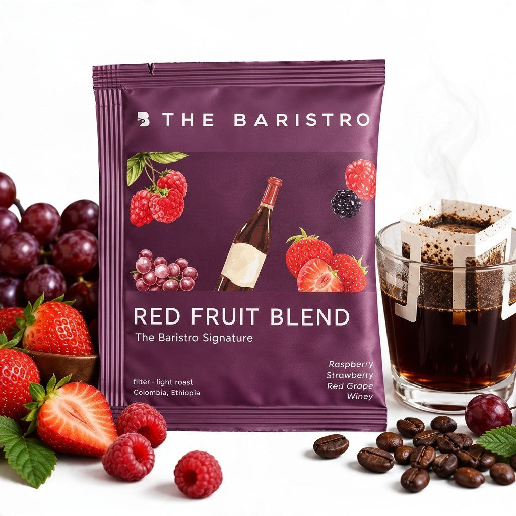Lamora The Baristro Red Fruit Blend specialty coffee drip bag with fresh raspberries, strawberries, and grapes.